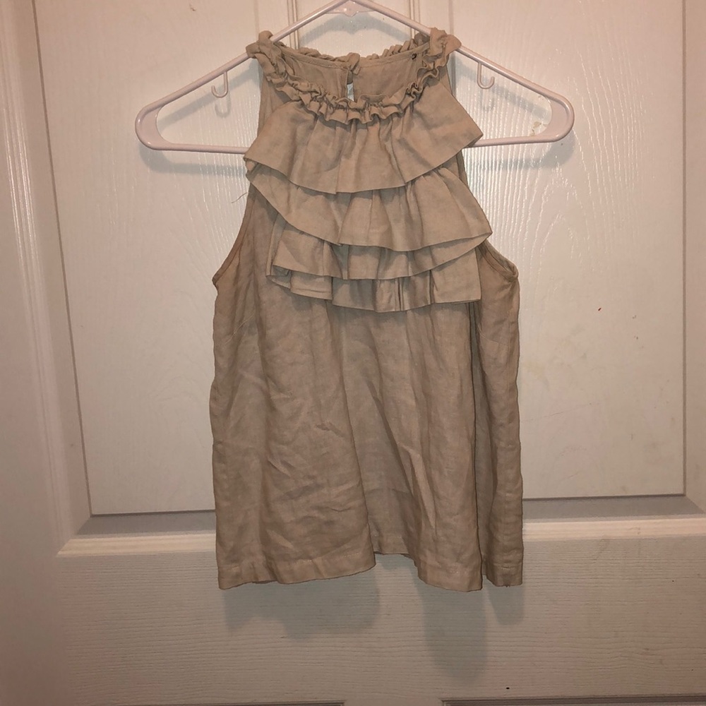 beige ruffle top